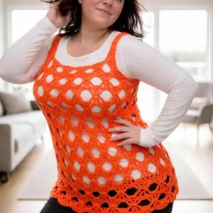 Haut orange flashy ajouré taille 44/46